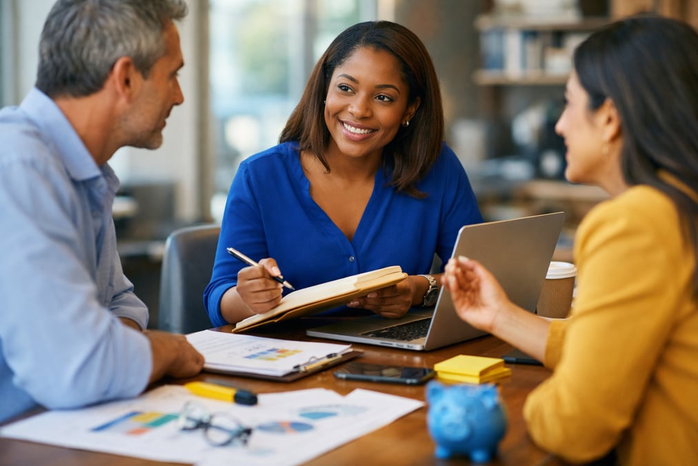 Man comparing Roth and Traditional account projections on a whiteboard